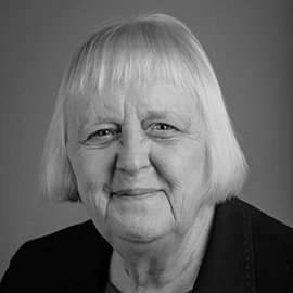 A black and white portrait photo of Carole Hillenbrand