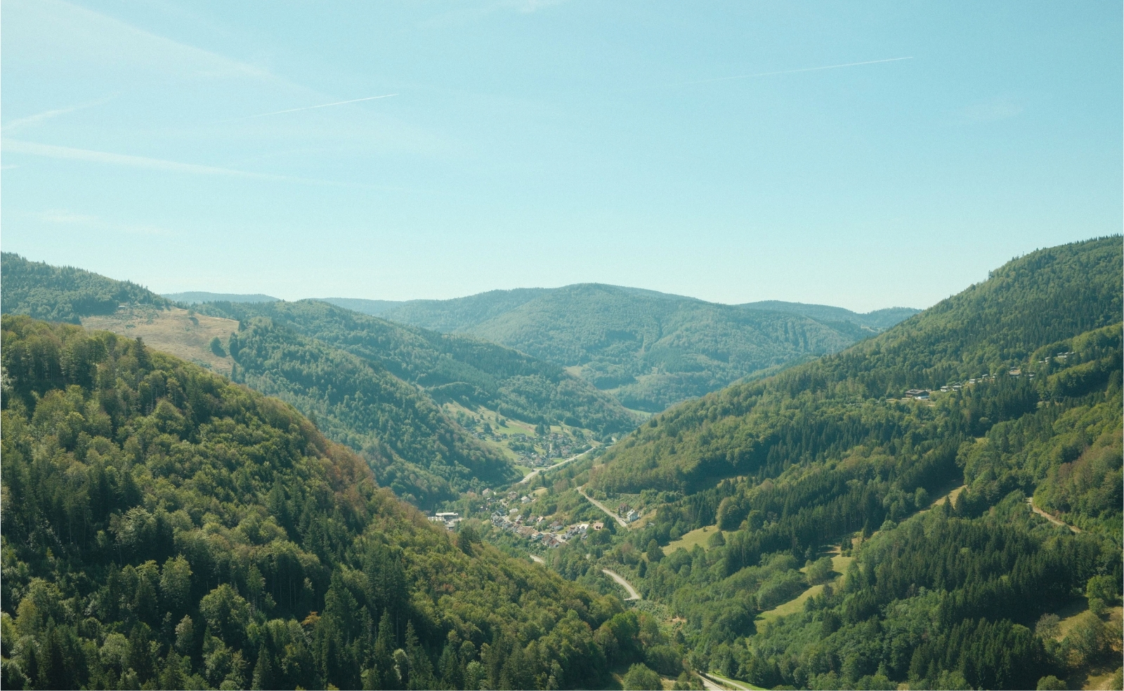 Aerial view of green hills and valleys in the Black Forest, Germany.